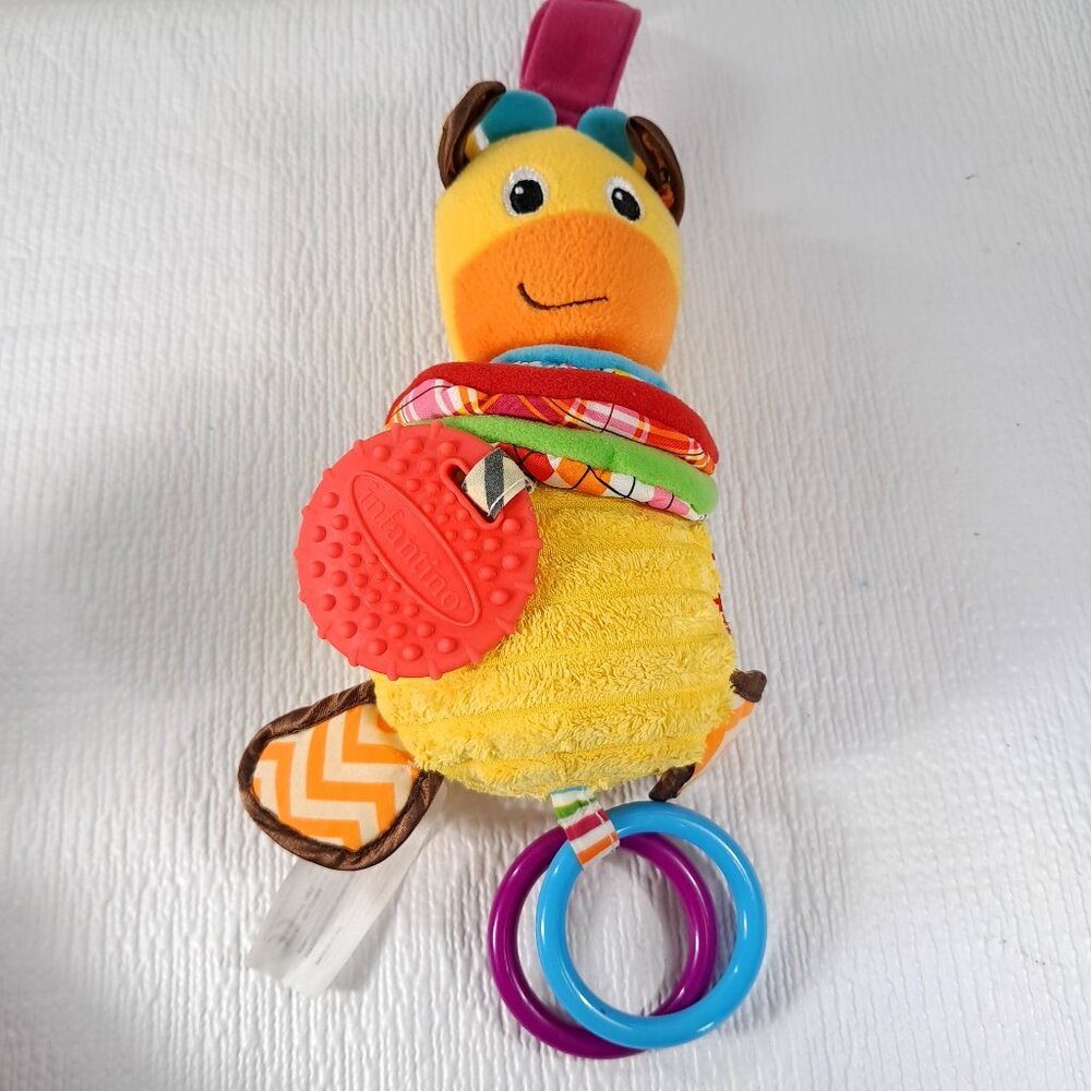 Infantino Hug and Tug Musical Giraffe Baby Plush Toy Crinkle lullaby music soft